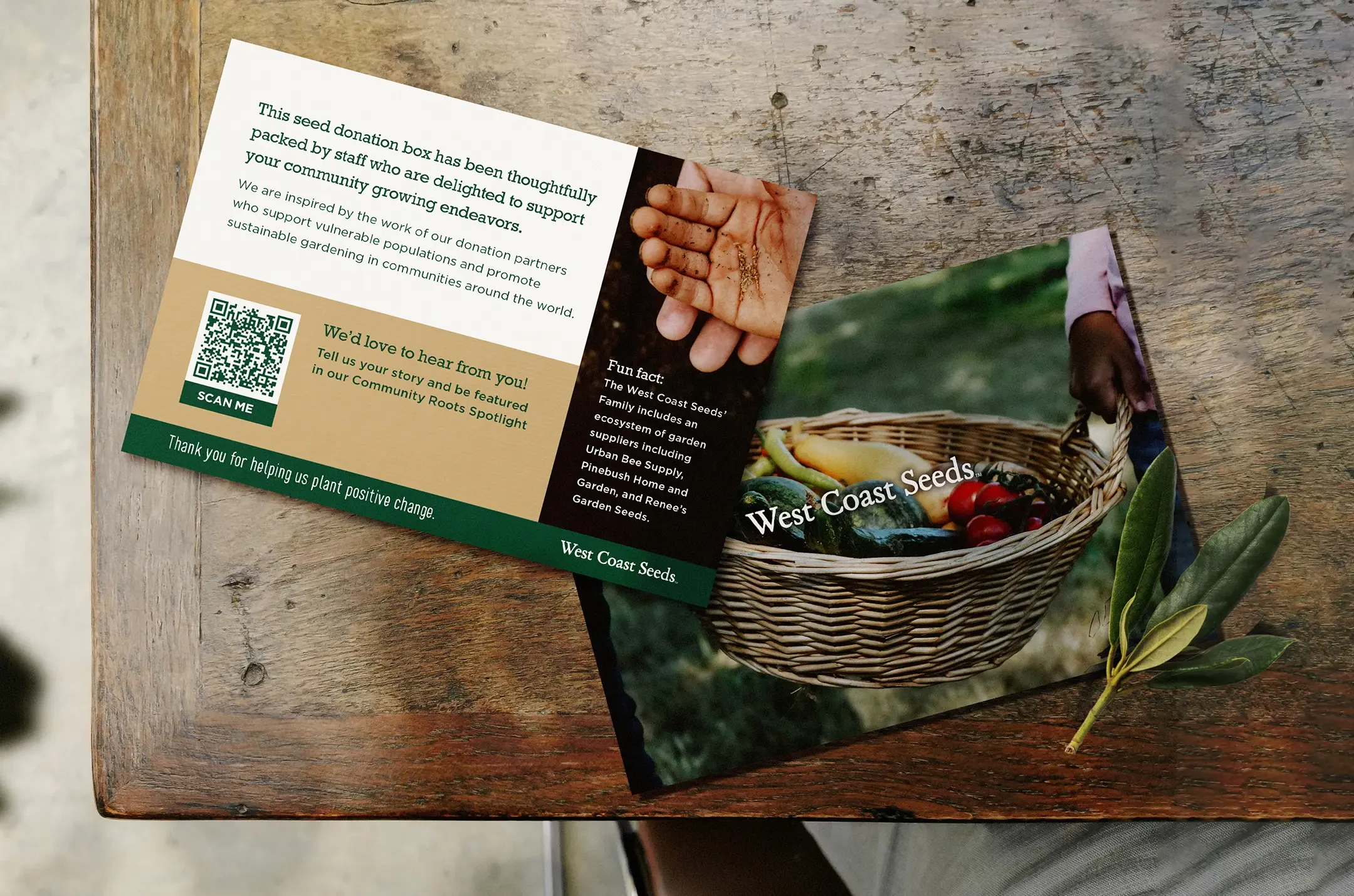 West Coast Seeds donation box materials with a QR code inviting support for community gardening